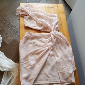 Light blush pink strapless dress and open midriff